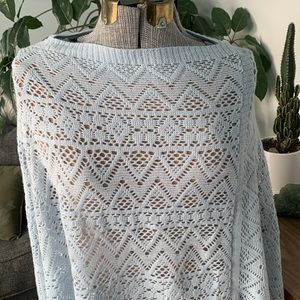 Sky blue knit shawl in like new condition- one size fits all